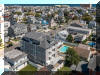 208 EAST 24TH AVENUE  UNIT #4 - NORTH WILDWOOD SUMMER VACATION RENTALS with POOLS & PRIVATE ELEVATOR at WILDWOODRENTS.COM managed by ISLAND REALTY GROUP - 4 bedroom, 2 bath vacation home with pool and private elevator! Ocean/bay view from the balconies. Home has a full kitchen with range, fridge, dishwasher, microwave, toaster, Keurig, disposal, and blender. Sleeps 10: king, queen, full/twin bunk and twin stand alone, queen sleep sofa. Amenities include: central a/c, washer/dryer, 2 car off street parking, wifi, pool, private elevator, storage, gas BBQ, No television in the main living room, televisions are in all 4 bedrooms. North Wildwood Rentals, Wildwood Rentals, Wildwood Crest Rentals and Diamond Beach Rentals in all price ranges for weekly, monthly, seasonal and weekend vacation rentals plus Wildwood real estate sales of homes, condos, vacation and investment properties in and around Wildwood New Jersey. We offer over 400 properties plus exclusive vacation homes so you can book the shore rental of your choice online and guarantee your vacation at the Shore. Rent with confidence at Island Realty Group! Visit www.wildwoodrents.com to book online or call our office at 609.522.4999. Our office at 1701 New Jersey Avenue in North Wildwood is open 7 days a week!