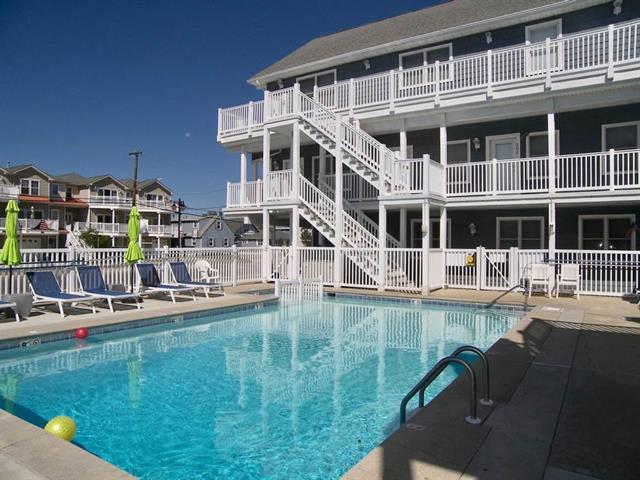 2207 SURF AVENUE  BAYBERRY #301 - NORTH WILDWOOD BEACHBLOCK SUMMER VACATION RENTALS with POOLS at WILDWOODRENTS.COM managed by ISLAND REALTY GROUP. Two bedroom, two bath vacation home located Beachblock at the Bayberry Condominiums in North Wildwood. Home offers a full kitchen with fridge, range, dishwasher, microwave, blender, crock-pot and Keurig. Sleeps 10: 3 queen beds, 2 double sleep sofas. Amenities include central a/c, washer/dryer, 1 car off street parking, wifi, pool, balcony, bbq. Upgrades to be completed for 2021: new flooring, cabinets, granite counters, new living room furnishings-pictures to follow. North Wildwood Rentals, Wildwood Rentals, Wildwood Crest Rentals and Diamond Beach Rentals in all price ranges for weekly, monthly, seasonal and weekend vacation rentals plus Wildwood real estate sales of homes, condos, vacation and investment properties in and around Wildwood New Jersey. We offer over 400 properties plus exclusive vacation homes so you can book the shore rental of your choice online and guarantee your vacation at the Shore. Rent with confidence at Island Realty Group! Visit www.wildwoodrents.com to book online or call our office at 609.522.4999. Our office at 1701 New Jersey Avenue in North Wildwood is open 7 days a week!