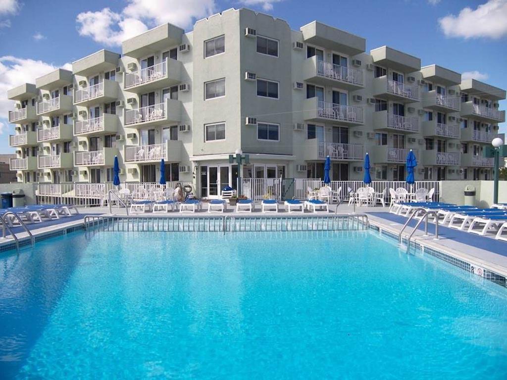 225 EAST WILDWOOD AVENUE  DIPLOMAT RESORT #105 - WILDWOOD SUMMER VACATION RENTALS with POOLS at WILDWOODRENTS.COM - One bedroom, one bath condo located at the Diplomat Condominiums in Wildwood. Unit has a kitchen with stovetop, fridge, microwave, toaster and coffeemaker. Sleeps 6; 2 full and full sleep sofa. Amenities include pool, outside shower, one car off street parking, gas bbq, elevator and wall a/c. Wildwood Rentals, North Wildwood Rentals, Wildwood Crest Rentals and Diamond Beach Rentals in all price ranges for weekly, monthly, seasonal and weekend vacation rentals plus Wildwood real estate sales of homes, condos, vacation and investment properties in and around Wildwood New Jersey. We offer over 400 properties plus exclusive vacation homes so you can book the shore rental of your choice online and guarantee your vacation at the Shore. Rent with confidence at Island Realty Group! Visit www.wildwoodrents.com to book online or call our office at 609.522.4999. Our office at 1701 New Jersey Avenue in North Wildwood is open 7 days a week!