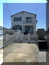 106 WEST 22ND AVENUE - NORTH WILDWOOD SUMMER VACATION RENTALS at WILDWOODRENTS.COM managed by ISLAND REALTY GROUP - Large single family home in North Wildwood! 6 bedrooms, 3 baths! The first floor has the living room, dining room and kitchen along with 2 bedrooms and a full bath. The 2nd floor offers 4 bedrooms and 2 baths. 3 set up as bedrooms/4th as a game room/hangout space with sleeping. Sleeps 14! Fully equipped kitchen with range, fridge, dishwasher, microwave, toaster oven, disposal, Keurig. Wet bar off of living room. Amenities include central a/c, washer/dryer, wifi, outside shower, storage, propane bbq, and decks! North Wildwood Rentals, Wildwood Rentals, Wildwood Crest Rentals and Diamond Beach Rentals in all price ranges for weekly, monthly, seasonal and weekend vacation rentals plus Wildwood real estate sales of homes, condos, vacation and investment properties in and around Wildwood New Jersey. We offer over 400 properties plus exclusive vacation homes so you can book the shore rental of your choice online and guarantee your vacation at the Shore. Rent with confidence at Island Realty Group! Visit www.wildwoodrents.com to book online or call our office at 609.522.4999. Our office at 1701 New Jersey Avenue in North Wildwood is open 7 days a week!