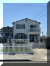 106 WEST 22ND AVENUE - NORTH WILDWOOD SUMMER VACATION RENTALS at WILDWOODRENTS.COM managed by ISLAND REALTY GROUP - Large single family home in North Wildwood! 6 bedrooms, 3 baths! The first floor has the living room, dining room and kitchen along with 2 bedrooms and a full bath. The 2nd floor offers 4 bedrooms and 2 baths. 3 set up as bedrooms/4th as a game room/hangout space with sleeping. Sleeps 14! Fully equipped kitchen with range, fridge, dishwasher, microwave, toaster oven, disposal, Keurig. Wet bar off of living room. Amenities include central a/c, washer/dryer, wifi, outside shower, storage, propane bbq, and decks! North Wildwood Rentals, Wildwood Rentals, Wildwood Crest Rentals and Diamond Beach Rentals in all price ranges for weekly, monthly, seasonal and weekend vacation rentals plus Wildwood real estate sales of homes, condos, vacation and investment properties in and around Wildwood New Jersey. We offer over 400 properties plus exclusive vacation homes so you can book the shore rental of your choice online and guarantee your vacation at the Shore. Rent with confidence at Island Realty Group! Visit www.wildwoodrents.com to book online or call our office at 609.522.4999. Our office at 1701 New Jersey Avenue in North Wildwood is open 7 days a week!