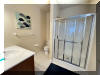 108 EAST 1ST AVENUE - North Wildwood Summer Rental - ENJOY YOUR VACATION WITH YOUR EXTENDED FAMILY in this incredible four bed/two bath first floor condo which very comfortably sleeps 10. Located on East First Avenue with only TWO SHORT BLOCKS TO THE BEACH. Various restaurants, pubs, shopping, miniature golf and water activities within close walking distance. Walk or take the bike trail to Wildwood s Boardwalk. Perfect for entertaining. Excellent accommodations in oversized bedrooms (1-King, 1-Queen, 4-Full/Double Beds). Features upgrades throughout including: flat screen televisions with cable service in all rooms, granite counters in kitchen, tile floors in kitchen and bathrooms, fireplace, beautiful furnishings with tropical decor, spacious rooms, oversized deck, full size washer and dryer, dishwasher, stove with oven, microwave oven, outside shower, parking for 3 cars(2-garage,1-driveway). BRING YOUR PERSONAL LAPTOP AND STAY CONNECTED WITH FREE WIRELESS INTERNET ACCESS. 