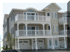 108 EAST 1ST AVENUE - North Wildwood Summer Rental - ENJOY YOUR VACATION WITH YOUR EXTENDED FAMILY in this incredible four bed/two bath first floor condo which very comfortably sleeps 10. Located on East First Avenue with only TWO SHORT BLOCKS TO THE BEACH. Various restaurants, pubs, shopping, miniature golf and water activities within close walking distance. Walk or take the bike trail to Wildwood s Boardwalk. Perfect for entertaining. Excellent accommodations in oversized bedrooms (1-King, 1-Queen, 4-Full/Double Beds). Features upgrades throughout including: flat screen televisions with cable service in all rooms, granite counters in kitchen, tile floors in kitchen and bathrooms, fireplace, beautiful furnishings with tropical decor, spacious rooms, oversized deck, full size washer and dryer, dishwasher, stove with oven, microwave oven, outside shower, parking for 3 cars(2-garage,1-driveway). BRING YOUR PERSONAL LAPTOP AND STAY CONNECTED WITH FREE WIRELESS INTERNET ACCESS. 