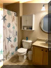 115 EAST HAND AVENUE #203 - WILDWOOD SUMMER VACATION RENTALS at WILDWOODRENTS.COM - Three bedroom + Loft bedroom/two bath vacation home that sleeps 14! Home offers a full kitchen with range, fridge, dishwasher, disposal, microwave, blender, and coffeemaker. Spacious open floor plan. Condo is approximately 2 blocks to Beach, Boardwalk, Shops, Fox Park & Convention Center. 1 block to area restaurants/bars (Mudhen Brewery, Dogtooth, Poppies, Marvis Diner to name a few). Private balcony, full size Washer/Dryer, Central a/c, wifi, 2 car garage parking Main floor features King w/ bath, 2 additional bedrooms with Queens. Loft is perfect for extra company or kids with 4 Queen beds and you still have plenty of space. Dinner table seats 10 and you have 4 additional seats at the island in the kitchen, 65 TV, Sleeps 14 in beds. Beautiful gas fireplace for the cooler seasonal usage. Wildwood Rentals, North Wildwood Rentals, Wildwood Crest Rentals and Diamond Beach Rentals in all price ranges for weekly, monthly, seasonal and weekend vacation rentals plus Wildwood real estate sales of homes, condos, vacation and investment properties in and around Wildwood New Jersey. We offer over 400 properties plus exclusive vacation homes so you can book the shore rental of your choice online and guarantee your vacation at the Shore. Rent with confidence at Island Realty Group! Visit www.wildwoodrents.com to book online or call our office at 609.522.4999. Our office at 1701 New Jersey Avenue in North Wildwood is open 7 days a week!