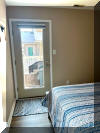 115 EAST HAND AVENUE #203 - WILDWOOD SUMMER VACATION RENTALS at WILDWOODRENTS.COM - Three bedroom + Loft bedroom/two bath vacation home that sleeps 14! Home offers a full kitchen with range, fridge, dishwasher, disposal, microwave, blender, and coffeemaker. Spacious open floor plan. Condo is approximately 2 blocks to Beach, Boardwalk, Shops, Fox Park & Convention Center. 1 block to area restaurants/bars (Mudhen Brewery, Dogtooth, Poppies, Marvis Diner to name a few). Private balcony, full size Washer/Dryer, Central a/c, wifi, 2 car garage parking Main floor features King w/ bath, 2 additional bedrooms with Queens. Loft is perfect for extra company or kids with 4 Queen beds and you still have plenty of space. Dinner table seats 10 and you have 4 additional seats at the island in the kitchen, 65 TV, Sleeps 14 in beds. Beautiful gas fireplace for the cooler seasonal usage. Wildwood Rentals, North Wildwood Rentals, Wildwood Crest Rentals and Diamond Beach Rentals in all price ranges for weekly, monthly, seasonal and weekend vacation rentals plus Wildwood real estate sales of homes, condos, vacation and investment properties in and around Wildwood New Jersey. We offer over 400 properties plus exclusive vacation homes so you can book the shore rental of your choice online and guarantee your vacation at the Shore. Rent with confidence at Island Realty Group! Visit www.wildwoodrents.com to book online or call our office at 609.522.4999. Our office at 1701 New Jersey Avenue in North Wildwood is open 7 days a week!