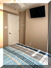 115 EAST HAND AVENUE #203 - WILDWOOD SUMMER VACATION RENTALS at WILDWOODRENTS.COM - Three bedroom + Loft bedroom/two bath vacation home that sleeps 14! Home offers a full kitchen with range, fridge, dishwasher, disposal, microwave, blender, and coffeemaker. Spacious open floor plan. Condo is approximately 2 blocks to Beach, Boardwalk, Shops, Fox Park & Convention Center. 1 block to area restaurants/bars (Mudhen Brewery, Dogtooth, Poppies, Marvis Diner to name a few). Private balcony, full size Washer/Dryer, Central a/c, wifi, 2 car garage parking Main floor features King w/ bath, 2 additional bedrooms with Queens. Loft is perfect for extra company or kids with 4 Queen beds and you still have plenty of space. Dinner table seats 10 and you have 4 additional seats at the island in the kitchen, 65 TV, Sleeps 14 in beds. Beautiful gas fireplace for the cooler seasonal usage. Wildwood Rentals, North Wildwood Rentals, Wildwood Crest Rentals and Diamond Beach Rentals in all price ranges for weekly, monthly, seasonal and weekend vacation rentals plus Wildwood real estate sales of homes, condos, vacation and investment properties in and around Wildwood New Jersey. We offer over 400 properties plus exclusive vacation homes so you can book the shore rental of your choice online and guarantee your vacation at the Shore. Rent with confidence at Island Realty Group! Visit www.wildwoodrents.com to book online or call our office at 609.522.4999. Our office at 1701 New Jersey Avenue in North Wildwood is open 7 days a week!