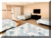 115 EAST HAND AVENUE #203 - WILDWOOD SUMMER VACATION RENTALS at WILDWOODRENTS.COM - Three bedroom + Loft bedroom/two bath vacation home that sleeps 14! Home offers a full kitchen with range, fridge, dishwasher, disposal, microwave, blender, and coffeemaker. Spacious open floor plan. Condo is approximately 2 blocks to Beach, Boardwalk, Shops, Fox Park & Convention Center. 1 block to area restaurants/bars (Mudhen Brewery, Dogtooth, Poppies, Marvis Diner to name a few). Private balcony, full size Washer/Dryer, Central a/c, wifi, 2 car garage parking Main floor features King w/ bath, 2 additional bedrooms with Queens. Loft is perfect for extra company or kids with 4 Queen beds and you still have plenty of space. Dinner table seats 10 and you have 4 additional seats at the island in the kitchen, 65 TV, Sleeps 14 in beds. Beautiful gas fireplace for the cooler seasonal usage. Wildwood Rentals, North Wildwood Rentals, Wildwood Crest Rentals and Diamond Beach Rentals in all price ranges for weekly, monthly, seasonal and weekend vacation rentals plus Wildwood real estate sales of homes, condos, vacation and investment properties in and around Wildwood New Jersey. We offer over 400 properties plus exclusive vacation homes so you can book the shore rental of your choice online and guarantee your vacation at the Shore. Rent with confidence at Island Realty Group! Visit www.wildwoodrents.com to book online or call our office at 609.522.4999. Our office at 1701 New Jersey Avenue in North Wildwood is open 7 days a week!
