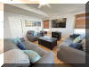 116 EAST 17TH AVENUE  #301 - NORTH WILDWOOD SUMMER VACATION RENTALS at WILDWOODRENTS.COM managed by ISLAND REALTY GROUP - Welcome to your dream vacation rental in North Wildwood Beach Side! This stunning property is perfect for large families, with enough space to comfortably sleep up to 12 guests across its 5 bedrooms and 3 full bathrooms. As you step inside, you'll be greeted by a spacious and beautifully furnished interior. The fully equipped kitchen boasts modern appliances including a dishwasher, microwave, coffee maker, and toaster oven, making meal prep a breeze. Each bedroom is thoughtfully designed for your comfort with a luxurious king bed, two queen beds, twin/twin bunk, and two single beds + double futon. The property also includes amenities such as central AC, a washer and dryer, iron, ironing board, and vacuum cleaner for your convenience. Enjoy the fresh sea breeze on the deck with deck furniture, or take in the stunning views from the balcony. The property also features an elevator for easy access to the ground floor, as well as a 2-car garage for your vehicles. For entertainment, there's high-speed internet, cable TV, and a smart TV for streaming your favorite shows and movies. Stay connected with wireless LAN and enjoy the convenience of a Keurig coffee maker for your morning brew. Please note that this property does not allow pets and linens are not provided, so be sure to bring your own. Cleaning is included in the rate, ensuring a stress-free stay. Don't miss out on this incredible vacation rental in North Wildwood Beach Side. Book now and make unforgettable memories with your loved ones! Home is on a Sunday to Sunday rental schedule. North Wildwood Rentals, Wildwood Rentals, Wildwood Crest Rentals and Diamond Beach Rentals in all price ranges for weekly, monthly, seasonal and weekend vacation rentals plus Wildwood real estate sales of homes, condos, vacation and investment properties in and around Wildwood New Jersey. We offer over 400 properties plus exclusive vacation homes so you can book the shore rental of your choice online and guarantee your vacation at the Shore. Rent with confidence at Island Realty Group! Visit www.wildwoodrents.com to book online or call our office at 609.522.4999. Our office at 1701 New Jersey Avenue in North Wildwood is open 7 days a week!