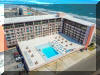 500 KENNEDY BOULEVARD � REGENCY #539 - NORTH WILDWOOD BEACHBLOCK SUMMER VACATION RENTALS with POOLS at WILDWOODRENTS.COM managed by ISLAND REALTY GROUP, NORTH WILDWOOD REALTORS AND VACATION RENTAL MANAGEMENT - Welcome to your perfect beachside getaway in North Wildwood! This charming 1-bedroom, 1-bathroom property is ideal for a group of up to 4 guests, offering a cozy retreat just steps away from the sandy shores.  As you step inside, you'll find a comfortable queen bed in the bedroom, along with a convenient queen sofa bed in the living area. The fully equipped kitchen features modern appliances such as a microwave, coffee maker, and toaster, making it easy to whip up delicious meals during your stay.  Enjoy the comforts of home with amenities like central AC, a washer and dryer, cable TV, and high-speed internet. Step outside onto the deck to soak up the sun or take a dip in the heated outdoor pool. With 2 TVs, you can catch up on your favorite shows while relaxing after a day at the beach.  This property also offers elevator access, parking for one vehicle, and a gas BBQ for cookouts with friends and family. Please note that this is a smoke-free property and pets are not accepted.  Located in the heart of North Wildwood Beach Side, you'll have easy access to the beach, restaurants, and shops. Whether you're looking to relax by the pool or explore the local attractions, this rental has everything you need for a memorable vacation.  Don't miss out on this fantastic opportunity to experience the best of North Wildwood. Book your stay today and start counting down the days until your beachside retreat!  North Wildwood Rentals, Wildwood Rentals, Wildwood Crest Rentals and Diamond Beach Rentals in all price ranges for weekly, monthly, seasonal and weekend vacation rentals plus Wildwood real estate sales of homes, condos, vacation and investment properties in and around Wildwood New Jersey. We offer over 400 properties plus exclusive vacation homes so you can book the shore rental of your choice online and guarantee your vacation at the Shore. Rent with confidence at Island Realty Group! Visit www.wildwoodrents.com to book online or call our office at 609.522.4999. Our office at 1701 New Jersey Avenue in North Wildwood is open 7 days a week!