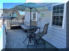 125 EAST 19TH AVENUE  UNIT 2 - NORTH WILDWOOD PET FRIENDLY SUMMER VACATION RENTALS at WILDWOODRENTS.COM managed by ISLAND REALTY GROUP - Welcome to your dream vacation rental in North Wildwood Beach Side! This spacious property is perfect for families, with enough room to comfortably sleep up to 10 guests. This charming beach house features 3 bedrooms and 2 full bathrooms, ensuring that everyone has their own space and privacy. The sleeping arrangements include a luxurious king bed, cozy queen bed, full/twin bunk, twin/twin bunk, a sofa bed, making it ideal for large families. The property is equipped with all the amenities you need for a comfortable stay, including a fully stocked kitchen with a dishwasher, microwave, disposal, coffee maker, toaster, blender, stove, full-size refrigerator, oven, and all the necessary cookware and dinnerware. The central AC and ceiling fans will keep you cool on hot summer days, while the washer, dryer, iron, and ironing board provide added convenience. Entertainment options abound with 4 TVs, cable TV, high-speed internet, and beach equipment for your enjoyment. Step outside to relax on the deck with deck furniture and a BBQ gas grill for al fresco dining. After a day at the beach, rinse off in the convenient outside shower. Pets are welcome at this property, so you can bring your furry friends along for the fun (fee). With wireless internet access, you can stay connected during your stay, and the property is smoke-free for your comfort. Don't worry about packing bulky items - this rental includes blankets, pillows, beach chairs, and all the essentials you need for a stress-free vacation. Just bring your own linens and get ready to relax and unwind in this beautifully furnished property. Book your stay at this North Wildwood gem today and make unforgettable memories with your loved ones! North Wildwood Rentals, Wildwood Rentals, Wildwood Crest Rentals and Diamond Beach Rentals in all price ranges for weekly, monthly, seasonal and weekend vacation rentals plus Wildwood real estate sales of homes, condos, vacation and investment properties in and around Wildwood New Jersey. We offer over 400 properties plus exclusive vacation homes so you can book the shore rental of your choice online and guarantee your vacation at the Shore. Rent with confidence at Island Realty Group! Visit www.wildwoodrents.com to book online or call our office at 609.522.4999. Our office at 1701 New Jersey Avenue in North Wildwood is open 7 days a week!