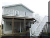 North Wildwood Rental at 125 E 19th Avenue - Three bedroom, two bath vacation home located in North Wildwood. Home offers a full kitchen with range, fridge, microwave, dishwasher, toaster, coffeemaker. Sleeps 8: queen, full, 3 twin and queen sleep sofa. Amenities include central a/c, yard, deck, gas