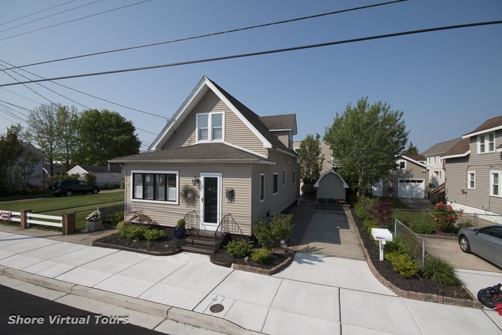 138 WEST BUTTERCUP ROAD - WILDWOOD CREST SEASONAL SUMMER VACATION RENTALS at WILDWOODRENTS.COM managed by ISLAND REALTY GROUP - Welcome to your perfect beach getaway in Wildwood Crest Bay Side! This charming 2-bedroom, 2-full bathroom property can sleep a total of 6 people, making it an ideal retreat for families or friends looking to enjoy the sun, sand, and sea. As you step inside, you'll find a cozy and well-appointed space featuring 1 Queen Bed, 2 Single Beds, and a Queen Sofa Bed, ensuring a comfortable night's sleep for all guests. The fully equipped kitchen boasts modern amenities such as a dishwasher, microwave, coffee maker, and toaster, making meal preparation a breeze. Other conveniences include a washer, dryer, iron, and ironing board, allowing you to pack light and enjoy a stress-free vacation. Relax and unwind in the spacious living area with central AC, or step outside to the deck and enjoy the fresh sea breeze. Fire up the BBQ gas grill for a delicious cookout, or take a leisurely stroll to the beach, just steps away from your front door. For your entertainment, there are TVs, cable TV, and high-speed internet provided. This property also offers additional amenities such as beach equipment, beach chairs, bicycles, and an enclosed outside shower, perfect for rinsing off after a day at the beach. With 2 parking spaces available, you can easily explore the surrounding area and enjoy all that Wildwood Crest has to offer. Don't forget to bring your furry friends along, as this property is pet-friendly! Whether you're looking to relax on the balcony, explore the nearby attractions, or simply soak up the sun, this rental has everything you need for a memorable beach vacation. Book your stay now and experience the best of Wildwood Crest living! Wildwood Crest Rentals, North Wildwood Rentals, Wildwood Rentals and Diamond Beach Rentals in all price ranges for weekly, monthly, seasonal and weekend vacation rentals plus Wildwood real estate sales of homes, condos, vacation and investment properties in and around Wildwood New Jersey. We offer over 400 properties plus exclusive vacation homes so you can book the shore rental of your choice online and guarantee your vacation at the Shore. Rent with confidence at Island Realty Group! Visit www.wildwoodrents.com to book online or call our office at 609.522.4999. Our office at 1701 New Jersey Avenue in North Wildwood is open 7 days a week!
