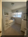 1605 OCEAN AVENUE  BRIGADOON CONDOS #212 - NORTH WILDWOOD BEACHBLOCK SUMMER VACATION RENTALS with POOLS at WILDWOODRENTS.COM managed by ISLAND REALTY GROUP, NORTH WILDWOOD REALTORS AND VACATION RENTAL MANAGEMENT - Welcome to your perfect beachside getaway in North Wildwood! This charming property is ideal for a family of up to 6 guests, offering 2 bedrooms and 1 full bathroom for your comfort and convenience. As you step inside, you'll find a cozy and well-appointed living space with all the amenities you need for a relaxing stay. The kitchen is fully equipped with a dishwasher, microwave, coffee maker, toaster, stove, and full-size refrigerator, making meal preparation a breeze. Enjoy your meals at the dining table or head out to the deck to dine al fresco with deck furniture and a gas BBQ grill. After a day at the beach, unwind in the comfortable living room with a sofa bed, smart TV, and high-speed internet access. The property features central AC and ceiling fans to keep you cool during the warmer months. For your convenience, there is a washer, dryer, and shared washer/dryer available on-site. When it's time to rest, the bedrooms offer a variety of sleeping arrangements including a double bed, twin/twin bunk with twin trundle bed. Linens are not provided, so be sure to bring your own. During your stay, take advantage of the outdoor pool, and outside shower shared with other guests. Parking is available for one vehicle. Located in North Wildwood Beach Side, this property is just a short walk away from the sandy shores and sparkling waters of the beach. Explore the local attractions, restaurants, and shops or simply relax and soak up the sun. Please note that this property does not allow pets and is smoke-free. Come and experience the best of beachside living at this North Wildwood retreat. Book your stay today! North Wildwood Rentals, Wildwood Rentals, Wildwood Crest Rentals and Diamond Beach Rentals in all price ranges for weekly, monthly, seasonal and weekend vacation rentals plus Wildwood real estate sales of homes, condos, vacation and investment properties in and around Wildwood New Jersey. We offer over 400 properties plus exclusive vacation homes so you can book the shore rental of your choice online and guarantee your vacation at the Shore. Rent with confidence at Island Realty Group! Visit www.wildwoodrents.com to book online or call our office at 609.522.4999. Our office at 1701 New Jersey Avenue in North Wildwood is open 7 days a week!