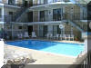 1800 ATLANTIC AVENUE - HAMILTON HOUSE CONDOS UNIT 202 - One bedroom, one bath condo located at the Hamilton Condos in North Wildwood. Sleeps 4, queen bed and queen sleep sofa. Efficiency style kitchen with fridge, stovetop, microwave, coffee maker and toaster. Amenities include ceiling fan, pool, gas grill, large flat screen television, wall a/c and one car assigned off street parking.  