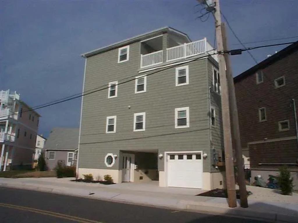 205 WEST PINE AVENUE - NORTH WILDWOOD SUMMER VACATION RENTALS at WILDWOODRENTS.COM managed by ISLAND REALTY GROUP - Welcome to your dream vacation rental in North Wildwood Bay Side! This spacious property is perfect for large families, with the capacity to sleep up to 12 guests comfortably. This charming property features 3 bedrooms and 2 full bathrooms, ensuring that everyone has plenty of space and privacy during their stay. 3 Queen, twin/twin bunk-bed, full futon, queen sleep sofa. Inside, you'll find a fully equipped kitchen with modern appliances such as a dishwasher, microwave, disposal, blender, stove, full-size refrigerator, mini refrigerator, oven, and Keurig coffee maker. The kitchen comes stocked with pots, pans, silverware, dinnerware, and cooking utensils, making it easy to prepare delicious meals during your stay. Other amenities include central AC, ceiling fans, a washer and dryer, 3 TVs with cable, high-speed internet, and a cozy living area perfect for relaxing after a day of exploring the city. Step outside to enjoy the fresh air on the deck, complete with deck furniture and a BBQ gas grill for outdoor dining. For your convenience, this property also offers an outside shower, balcony, lobster pot, blankets, pillows, and smoke-free accommodations. Cleaning is included in the rate, ensuring a stress-free stay for all guests. Please note that this property does not allow pets, so you can enjoy your vacation without any furry interruptions. Additionally, tenants are required to bring their own linens. Don't miss out on the opportunity to stay in this vacation home in North Wildwood . Book your stay today and create unforgettable memories with your loved ones! North Wildwood Rentals, Wildwood Rentals, Wildwood Crest Rentals and Diamond Beach Rentals in all price ranges for weekly, monthly, seasonal and weekend vacation rentals plus Wildwood real estate sales of homes, condos, vacation and investment properties in and around Wildwood New Jersey. We offer over 400 properties plus exclusive vacation homes so you can book the shore rental of your choice online and guarantee your vacation at the Shore. Rent with confidence at Island Realty Group! Visit www.wildwoodrents.com to book online or call our office at 609.522.4999. Our office at 1701 New Jersey Avenue in North Wildwood is open 7 days a week!