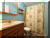 207 EAST 11TH AVENUE  OCEANSIDE UNIT - NORTH WILDWOOD SUMMER VACATION RENTALS at WILDWOODRENTS.COM managed by ISLAND REALTY GROUP - Welcome to your beachside getaway in North Wildwood! This charming property is ideal for a family of up to 6 guests, offering 2 cozy bedrooms and 1 full bathroom. As you step inside, you'll find a comfortable living space with all the amenities you need for a relaxing stay. The kitchen is fully equipped with a microwave, coffee maker, toaster, blender, stove, full-size refrigerator, oven, and all the cooking utensils you could need. Enjoy your meals at the dining table. The bedroom feature 2 single beds (swing king). The 2nd bedroom is a twin and full/twin bunk bed , there is an air mattress for additional sleeping arrangements. All beds come with mattress pads, pillows, and blankets to ensure a restful night's sleep. Relax on the open/covered porch with deck furniture, perfect for enjoying the fresh sea breeze. Stay entertained with the smart TV and free WiFi provided. This property is pet-free and smoke-free, ensuring a clean and comfortable environment for all guests. Located just a few blocks away from North Wildwood Beach, this property offers easy access to the sand and surf. Take advantage of the lawn area, play area, and BBQ natural gas grill for outdoor fun. Don't miss out on this fantastic vacation rental in North Wildwood! Book your stay now and create unforgettable memories by the shore. North Wildwood Rentals, Wildwood Rentals, Wildwood Crest Rentals and Diamond Beach Rentals in all price ranges for weekly, monthly, seasonal and weekend vacation rentals plus Wildwood real estate sales of homes, condos, vacation and investment properties in and around Wildwood New Jersey. We offer over 400 properties plus exclusive vacation homes so you can book the shore rental of your choice online and guarantee your vacation at the Shore. Rent with confidence at Island Realty Group! Visit www.wildwoodrents.com to book online or call our office at 609.522.4999. Our office at 1701 New Jersey Avenue in North Wildwood is open 7 days a week!