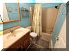 207 EAST 11TH AVENUE  OCEANSIDE UNIT - NORTH WILDWOOD SUMMER VACATION RENTALS at WILDWOODRENTS.COM managed by ISLAND REALTY GROUP - Welcome to your beachside getaway in North Wildwood! This charming property is ideal for a family of up to 6 guests, offering 2 cozy bedrooms and 1 full bathroom. As you step inside, you'll find a comfortable living space with all the amenities you need for a relaxing stay. The kitchen is fully equipped with a microwave, coffee maker, toaster, blender, stove, full-size refrigerator, oven, and all the cooking utensils you could need. Enjoy your meals at the dining table. The bedroom feature 2 single beds (swing king). The 2nd bedroom is a twin and full/twin bunk bed , there is an air mattress for additional sleeping arrangements. All beds come with mattress pads, pillows, and blankets to ensure a restful night's sleep. Relax on the open/covered porch with deck furniture, perfect for enjoying the fresh sea breeze. Stay entertained with the smart TV and free WiFi provided. This property is pet-free and smoke-free, ensuring a clean and comfortable environment for all guests. Located just a few blocks away from North Wildwood Beach, this property offers easy access to the sand and surf. Take advantage of the lawn area, play area, and BBQ natural gas grill for outdoor fun. Don't miss out on this fantastic vacation rental in North Wildwood! Book your stay now and create unforgettable memories by the shore. North Wildwood Rentals, Wildwood Rentals, Wildwood Crest Rentals and Diamond Beach Rentals in all price ranges for weekly, monthly, seasonal and weekend vacation rentals plus Wildwood real estate sales of homes, condos, vacation and investment properties in and around Wildwood New Jersey. We offer over 400 properties plus exclusive vacation homes so you can book the shore rental of your choice online and guarantee your vacation at the Shore. Rent with confidence at Island Realty Group! Visit www.wildwoodrents.com to book online or call our office at 609.522.4999. Our office at 1701 New Jersey Avenue in North Wildwood is open 7 days a week!