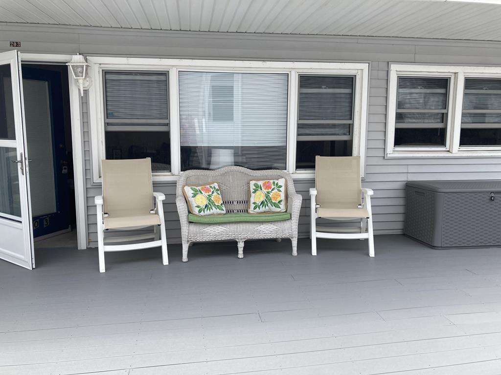 210 EAST RAMBLER ROAD #203 - WILDWOOD CREST SUMMER VACATION RENTALS at WILDWOODRENTS.COM managed by ISLAND REALTY GROUP - Welcome to your beachside retreat in Wildwood Crest! This charming property is perfect for a group of up to 6 guests, offering 2 cozy bedrooms and 1 full bathroom. As you step inside, you'll find a well-equipped kitchen featuring modern appliances such as a dishwasher, microwave, coffee maker, and toaster. The open living area includes a comfortable sofa bed and a TV for your entertainment needs. Central AC and ceiling fans ensure a pleasant indoor climate throughout your stay. Both bedrooms are furnished with queen beds, and there is a queen sleep sofa, guaranteeing a restful night's sleep after a day of beachside fun. The property also provides linens, pillows, and blankets for your convenience. Step outside onto the deck or balcony to enjoy the fresh sea breeze, or fire up the shared gas BBQ for a delightful outdoor meal. Beach chairs are provided for your beach days, and an outside shower is available for rinsing off sandy toes. Convenient amenities like a washer, dryer, and high-speed internet are included for your comfort. Parking is available for one vehicle, and utilities are covered in the rental rate. Located in the heart of Wildwood Crest, this property offers easy access to the beach and local attractions. Whether you're looking to relax on the sand or explore the nearby shops and restaurants, this rental is the perfect home base for your coastal getaway. Don't miss out on this fantastic opportunity to experience the best of Wildwood Crest. Book your stay today and create unforgettable memories at this beachside oasis! *Homeowner has cats that have been present in the home* Wildwood Crest Rentals, North Wildwood Rentals, Wildwood Rentals and Diamond Beach Rentals in all price ranges for weekly, monthly, seasonal and weekend vacation rentals plus Wildwood real estate sales of homes, condos, vacation and investment properties in and around Wildwood New Jersey. We offer over 400 properties plus exclusive vacation homes so you can book the shore rental of your choice online and guarantee your vacation at the Shore. Rent with confidence at Island Realty Group! Visit www.wildwoodrents.com to book online or call our office at 609.522.4999. Our office at 1701 New Jersey Avenue in North Wildwood is open 7 days a week!