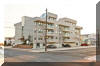215 SURF AVENUE #201, NORTH WILDWOOD RENTALS -  Two bedroom, two bath condo located at the Windsurfer Condominiums in North Wildwood. Home offers a full kitchen with range, refrigerator, dishwasher, microwave, icemaker, coffeemaker, and toaster. Amenities include central a/c, washer/dryer, wifi, elevator, and balcony. Sleeps 6; 2 queen and queen sleep sofa. Bedrooms have tv and dvd player