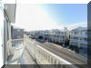 217 EAST GARFIELD AVENUE #200 IN WILDWOOD - Four bedroom, two bath condo located 1.5 blocks to the beach and boardwalk. Home offers a full kitchen with range, fridge, icemaker, dishwasher, microwave, toaster and coffeemaker. Amenities include central a/c, wifi, coal grill, outside shower, and 2 car off street parking. Sleeps 11; 2 queen, 5 twin, and queen sleep sofa. Wildwood Rentals, North Wildwood Rentals, Wildwood Crest Rentals and Diamond Beach Rentals in all price ranges for weekly, monthly, seasonal and weekend vacation rentals plus Wildwood real estate sales of homes, condos, vacation and investment properties in and around Wildwood New Jersey. We offer over 400 properties plus exclusive vacation homes so you can book the shore rental of your choice online and guarantee your vacation at the Shore. Rent with confidence at Island Realty Group!