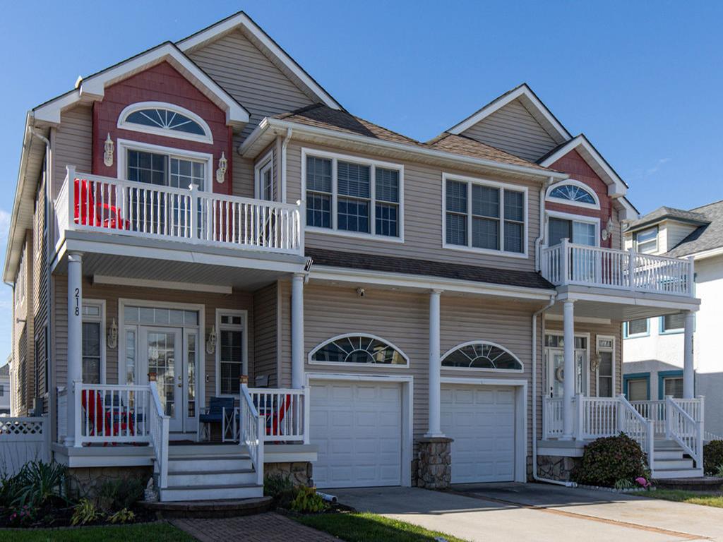 218 EAST CRESSE AVENUE - WILDWOOD CREST SUMMER RENTALS - Spacious 4 bedroom, 3 bath townhouse style vacation home located 2 blocks to the beach! Large floor plan offers a family room on the first floor accompanied by an open concept kitchen, dining room, living room and half bath. There is a large deck on the first floor rear spacious enough to relax and enjoy the ocean air. The 2nd floor offers two master bedrooms, one with a Jacuzzi bath and walk in shower. This large floor plan also includes 2 additional bedrooms, a full hall bath and 2 balconies! Beautiful decor. Sleeps 12; 2 queen, full, full/twin bunk with full trundle, sleep sofa. Fully equipped kitchen offers a full fridge, ice maker, range, disposal, dishwasher, coffeemaker, blender, and toaster. Amenities include 3 balconies, front porch, central a/c, washer/dryer, gas bbq and 2 car off street parking. Wildwood Crest Rentals, North Wildwood Rentals, Wildwood Rentals and Diamond Beach Rentals in all price ranges for weekly, monthly, seasonal and weekend vacation rentals plus Wildwood real estate sales of homes, condos, vacation and investment properties in and around Wildwood New Jersey. We offer over 400 properties plus exclusive vacation homes so you can book the shore rental of your choice online and guarantee your vacation at the Shore. Rent with confidence at Island Realty Group! Visit www.wildwoodrents.com to book online or call our office at 609.522.4999. Our office at 1701 New Jersey Avenue in North Wildwood is open 7 days a week!
