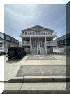 218 WEST 19TH AVENUE - NORTH WILDWOOD SEASONAL SUMMER VACATION RENTALS at WILDWOODRENTS.COM managed by ISLAND REALTY GROUP - This property is perfect for families , with 4 bedrooms and 3.5 bathrooms that can comfortably sleep up to 8 guests. As you step inside, you'll find a bedroom, with full bath. Two additional bedrooms with a shared bath are on the first floor. The 2nd floor you'll find a spacious and living space with all the amenities you could ask for. The kitchen is fully equipped with a dishwasher, microwave, disposal, coffee maker, toaster oven, blender, and more. The central AC and ceiling fans will keep you cool and comfortable throughout your stay. Each bedroom is thoughtfully designed there is 1 Queen bedroom, (2) twin & twin bedrooms, and a bedroom with a twin/twin bunk, providing plenty of sleeping options for everyone. The property also features a garage and 3 parking spaces for your convenience. Relax and unwind on one of the 4 decks, complete with deck furniture and beach equipment for your enjoyment. High-speed internet, smart TVs, and wireless LAN are available for your entertainment needs. For your convenience, linens, blankets, pillows, and beach essentials are provided. You'll also find a Keurig coffee maker, pots and pans, silverware, dinnerware, and cooking utensils in the fully equipped kitchen. This property is smoke-free and does not allow pets, ensuring a clean and comfortable environment for all guests. With 5 bicycles at your disposal, you can easily explore the beautiful surroundings of North Wildwood. Don't miss out on this fantastic vacation rental with all the comforts of home and more. Book your stay now and create unforgettable memories in North Wildwood Bay Side! North Wildwood Rentals, Wildwood Rentals, Wildwood Crest Rentals and Diamond Beach Rentals in all price ranges for weekly, monthly, seasonal and weekend vacation rentals plus Wildwood real estate sales of homes, condos, vacation and investment properties in and around Wildwood New Jersey. We offer over 400 properties plus exclusive vacation homes so you can book the shore rental of your choice online and guarantee your vacation at the Shore. Rent with confidence at Island Realty Group! Visit www.wildwoodrents.com to book online or call our office at 609.522.4999. Our office at 1701 New Jersey Avenue in North Wildwood is open 7 days a week!