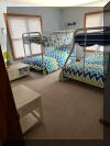 221 HOFFMAN AVENUE - NORTH WILDWOOD SUMMER WATERFRONT VACATION RENTALS at WILDWOODRENTS.COM managed by ISLAND REALTY GROUP - Welcome to your perfect inlet front getaway in North Wildwood! This charming traditional Wildwood property is ideal for a family of up to 7 guests, offering 3 cozy bedrooms and 2 full bathrooms for your comfort and convenience. As you step inside, you'll find a well-appointed living space with all the amenities you need for a relaxing stay. The fully equipped kitchen features a dishwasher, microwave, coffee maker, toaster oven, stove, and a full-size refrigerator, making meal preparation a breeze. The dining area is perfect for enjoying meals together, and the comfortable living room is ideal for unwinding after a day at the beach. The sleeping arrangements include 2 queen beds, full/twin bunk and twin/twin bunk, ensuring that everyone has a comfortable place to rest. Central AC and ceiling fans keep the interior cool on hot days, while the washer and dryer make it easy to keep your beachwear fresh throughout your stay. Outside, you'll find a wrap around deck with deck furniture where you can soak up the sun or enjoy al fresco dining. STUNNING VIEWS FROM EVERY ANGLE! The property also features a balcony, lawn area, and parking for your convenience. Please note that this rental does not allow pets and guests are required to bring their own linens. Located in the heart of North Wildwood Beach Side, this property is just a short walk away from the sandy shores and sparkling waters of the beach. Explore the local attractions, restaurants, and shops, or simply relax and unwind in your own private oasis. Don't miss out on the opportunity to experience the best of North Wildwood from this fantastic rental property. Book your stay today and create unforgettable memories with your loved ones! North Wildwood Rentals, Wildwood Rentals, Wildwood Crest Rentals and Diamond Beach Rentals in all price ranges for weekly, monthly, seasonal and weekend vacation rentals plus Wildwood real estate sales of homes, condos, vacation and investment properties in and around Wildwood New Jersey. We offer over 400 properties plus exclusive vacation homes so you can book the shore rental of your choice online and guarantee your vacation at the Shore. Rent with confidence at Island Realty Group! Visit www.wildwoodrents.com to book online or call our office at 609.522.4999. Our office at 1701 New Jersey Avenue in North Wildwood is open 7 days a week!