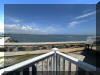 221 HOFFMAN AVENUE - NORTH WILDWOOD SUMMER WATERFRONT VACATION RENTALS at WILDWOODRENTS.COM managed by ISLAND REALTY GROUP - Welcome to your perfect inlet front getaway in North Wildwood! This charming traditional Wildwood property is ideal for a family of up to 7 guests, offering 3 cozy bedrooms and 2 full bathrooms for your comfort and convenience. As you step inside, you'll find a well-appointed living space with all the amenities you need for a relaxing stay. The fully equipped kitchen features a dishwasher, microwave, coffee maker, toaster oven, stove, and a full-size refrigerator, making meal preparation a breeze. The dining area is perfect for enjoying meals together, and the comfortable living room is ideal for unwinding after a day at the beach. The sleeping arrangements include 2 queen beds, full/twin bunk and twin/twin bunk, ensuring that everyone has a comfortable place to rest. Central AC and ceiling fans keep the interior cool on hot days, while the washer and dryer make it easy to keep your beachwear fresh throughout your stay. Outside, you'll find a wrap around deck with deck furniture where you can soak up the sun or enjoy al fresco dining. STUNNING VIEWS FROM EVERY ANGLE! The property also features a balcony, lawn area, and parking for your convenience. Please note that this rental does not allow pets and guests are required to bring their own linens. Located in the heart of North Wildwood Beach Side, this property is just a short walk away from the sandy shores and sparkling waters of the beach. Explore the local attractions, restaurants, and shops, or simply relax and unwind in your own private oasis. Don't miss out on the opportunity to experience the best of North Wildwood from this fantastic rental property. Book your stay today and create unforgettable memories with your loved ones! North Wildwood Rentals, Wildwood Rentals, Wildwood Crest Rentals and Diamond Beach Rentals in all price ranges for weekly, monthly, seasonal and weekend vacation rentals plus Wildwood real estate sales of homes, condos, vacation and investment properties in and around Wildwood New Jersey. We offer over 400 properties plus exclusive vacation homes so you can book the shore rental of your choice online and guarantee your vacation at the Shore. Rent with confidence at Island Realty Group! Visit www.wildwoodrents.com to book online or call our office at 609.522.4999. Our office at 1701 New Jersey Avenue in North Wildwood is open 7 days a week!