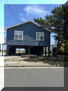 221 HOFFMAN AVENUE - NORTH WILDWOOD SUMMER WATERFRONT VACATION RENTALS at WILDWOODRENTS.COM managed by ISLAND REALTY GROUP - Welcome to your perfect inlet front getaway in North Wildwood! This charming traditional Wildwood property is ideal for a family of up to 7 guests, offering 3 cozy bedrooms and 2 full bathrooms for your comfort and convenience. As you step inside, you'll find a well-appointed living space with all the amenities you need for a relaxing stay. The fully equipped kitchen features a dishwasher, microwave, coffee maker, toaster oven, stove, and a full-size refrigerator, making meal preparation a breeze. The dining area is perfect for enjoying meals together, and the comfortable living room is ideal for unwinding after a day at the beach. The sleeping arrangements include 2 queen beds, full/twin bunk and twin/twin bunk, ensuring that everyone has a comfortable place to rest. Central AC and ceiling fans keep the interior cool on hot days, while the washer and dryer make it easy to keep your beachwear fresh throughout your stay. Outside, you'll find a wrap around deck with deck furniture where you can soak up the sun or enjoy al fresco dining. STUNNING VIEWS FROM EVERY ANGLE! The property also features a balcony, lawn area, and parking for your convenience. Please note that this rental does not allow pets and guests are required to bring their own linens. Located in the heart of North Wildwood Beach Side, this property is just a short walk away from the sandy shores and sparkling waters of the beach. Explore the local attractions, restaurants, and shops, or simply relax and unwind in your own private oasis. Don't miss out on the opportunity to experience the best of North Wildwood from this fantastic rental property. Book your stay today and create unforgettable memories with your loved ones! North Wildwood Rentals, Wildwood Rentals, Wildwood Crest Rentals and Diamond Beach Rentals in all price ranges for weekly, monthly, seasonal and weekend vacation rentals plus Wildwood real estate sales of homes, condos, vacation and investment properties in and around Wildwood New Jersey. We offer over 400 properties plus exclusive vacation homes so you can book the shore rental of your choice online and guarantee your vacation at the Shore. Rent with confidence at Island Realty Group! Visit www.wildwoodrents.com to book online or call our office at 609.522.4999. Our office at 1701 New Jersey Avenue in North Wildwood is open 7 days a week!