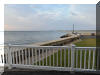 221 HOFFMAN AVENUE - NORTH WILDWOOD SUMMER WATERFRONT VACATION RENTALS at WILDWOODRENTS.COM managed by ISLAND REALTY GROUP - Welcome to your perfect inlet front getaway in North Wildwood! This charming traditional Wildwood property is ideal for a family of up to 7 guests, offering 3 cozy bedrooms and 2 full bathrooms for your comfort and convenience. As you step inside, you'll find a well-appointed living space with all the amenities you need for a relaxing stay. The fully equipped kitchen features a dishwasher, microwave, coffee maker, toaster oven, stove, and a full-size refrigerator, making meal preparation a breeze. The dining area is perfect for enjoying meals together, and the comfortable living room is ideal for unwinding after a day at the beach. The sleeping arrangements include 2 queen beds, full/twin bunk and twin/twin bunk, ensuring that everyone has a comfortable place to rest. Central AC and ceiling fans keep the interior cool on hot days, while the washer and dryer make it easy to keep your beachwear fresh throughout your stay. Outside, you'll find a wrap around deck with deck furniture where you can soak up the sun or enjoy al fresco dining. STUNNING VIEWS FROM EVERY ANGLE! The property also features a balcony, lawn area, and parking for your convenience. Please note that this rental does not allow pets and guests are required to bring their own linens. Located in the heart of North Wildwood Beach Side, this property is just a short walk away from the sandy shores and sparkling waters of the beach. Explore the local attractions, restaurants, and shops, or simply relax and unwind in your own private oasis. Don't miss out on the opportunity to experience the best of North Wildwood from this fantastic rental property. Book your stay today and create unforgettable memories with your loved ones! North Wildwood Rentals, Wildwood Rentals, Wildwood Crest Rentals and Diamond Beach Rentals in all price ranges for weekly, monthly, seasonal and weekend vacation rentals plus Wildwood real estate sales of homes, condos, vacation and investment properties in and around Wildwood New Jersey. We offer over 400 properties plus exclusive vacation homes so you can book the shore rental of your choice online and guarantee your vacation at the Shore. Rent with confidence at Island Realty Group! Visit www.wildwoodrents.com to book online or call our office at 609.522.4999. Our office at 1701 New Jersey Avenue in North Wildwood is open 7 days a week!