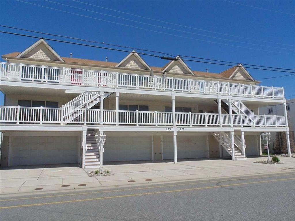 225 EAST DAVIS AVENUE – UNIT D - WILDWOOD SUMMER VACATION RENTALS at WILDWOODRENTS.COM managed by ISLAND REALTY GROUP – 3 bedroom, 2 bath vacation home located 2 blocks to the beach in Wildwood. Home offers a full kitchen with range, fridge, dishwasher, disposal, microwave, blender, toaster and coffeemaker. Amenities include central a/c, washer/dryer, balcony and 3 car off street parking. Sleeps 8: queen, full, 2 twin and queen sleep sofa.  Wildwood Rentals, North Wildwood Rentals, Wildwood Crest Rentals and Diamond Beach Rentals in all price ranges for weekly, monthly, seasonal and weekend vacation rentals plus Wildwood real estate sales of homes, condos, vacation and investment properties in and around Wildwood New Jersey. We offer over 400 properties plus exclusive vacation homes so you can book the shore rental of your choice online and guarantee your vacation at the Shore. Rent with confidence at Island Realty Group! Visit www.wildwoodrents.com to book online or call our office at 609.522.4999. Our office at 1701 New Jersey Avenue in North Wildwood is open 7 days a week!