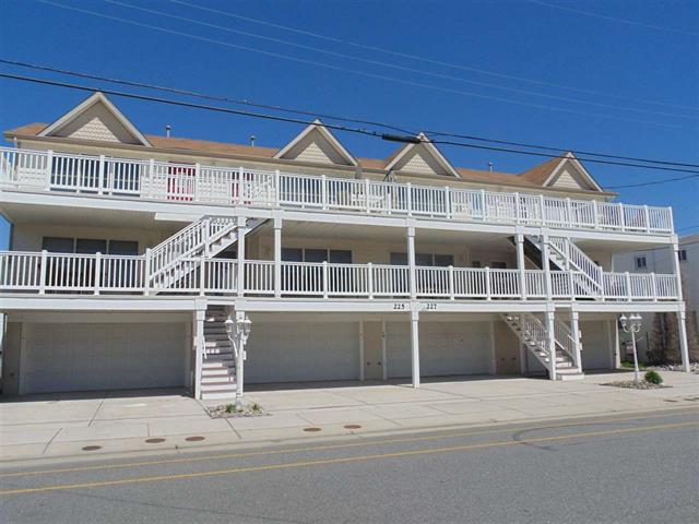 225 EAST DAVIS AVENUE UNIT E - WILDWOOD SUMMER VACATION RENTALS - Three bedroom, two bath vacation home close to the beach and boards in Wildwood, sunny end unit with plenty of natural light! Kitchen has range, fridge, microwave, disposal, dishwasher, blender and toaster. Amenities include central a/c, washer/dryer, balcony, 3 car off street parking, wireless internet and local phone. Sleeps 9; 2 Queens, 3 Singles, 1 Bunk, 1 Queen Sofa Bed. Wildwood Rentals, North Wildwood Rentals, Wildwood Crest Rentals and Diamond Beach Rentals in all price ranges for weekly, monthly, seasonal and weekend vacation rentals plus Wildwood real estate sales of homes, condos, vacation and investment properties in and around Wildwood New Jersey. We offer over 400 properties plus exclusive vacation homes so you can book the shore rental of your choice online and guarantee your vacation at the Shore. Rent with confidence at Island Realty Group! Visit www.wildwoodrents.com to book online or call our office at 609.522.4999. Our office at 1701 New Jersey Avenue in North Wildwood is open 7 days a week!