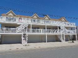 225 EAST DAVIS AVENUE UNIT E - WILDWOOD SUMMER VACATION RENTAL - Three bedroom, two bath vacation home close to the beach and boards in Wildwood. Kitchen has range, fridge, microwave, disposal, dishwasher, blender and toaster. Amenities include central a/c, washer/dryer, balcony, 3 car off street parking, wireless internet and local phone. Sleeps 8; 2 Queens, 3 Singles, 1 Bunk, 1 Queen Sofa Bed. Wildwood Rentals, North Wildwood Rentals, Wildwood Crest Rentals and Diamond Beach Rentals in all price ranges for weekly, monthly, seasonal and weekend vacation rentals plus Wildwood real estate sales of homes, condos, vacation and investment properties in and around Wildwood New Jersey. We offer over 400 properties plus exclusive vacation homes so you can book the shore rental of your choice online and guarantee your vacation at the Shore. Rent with confidence at Island Realty Group!