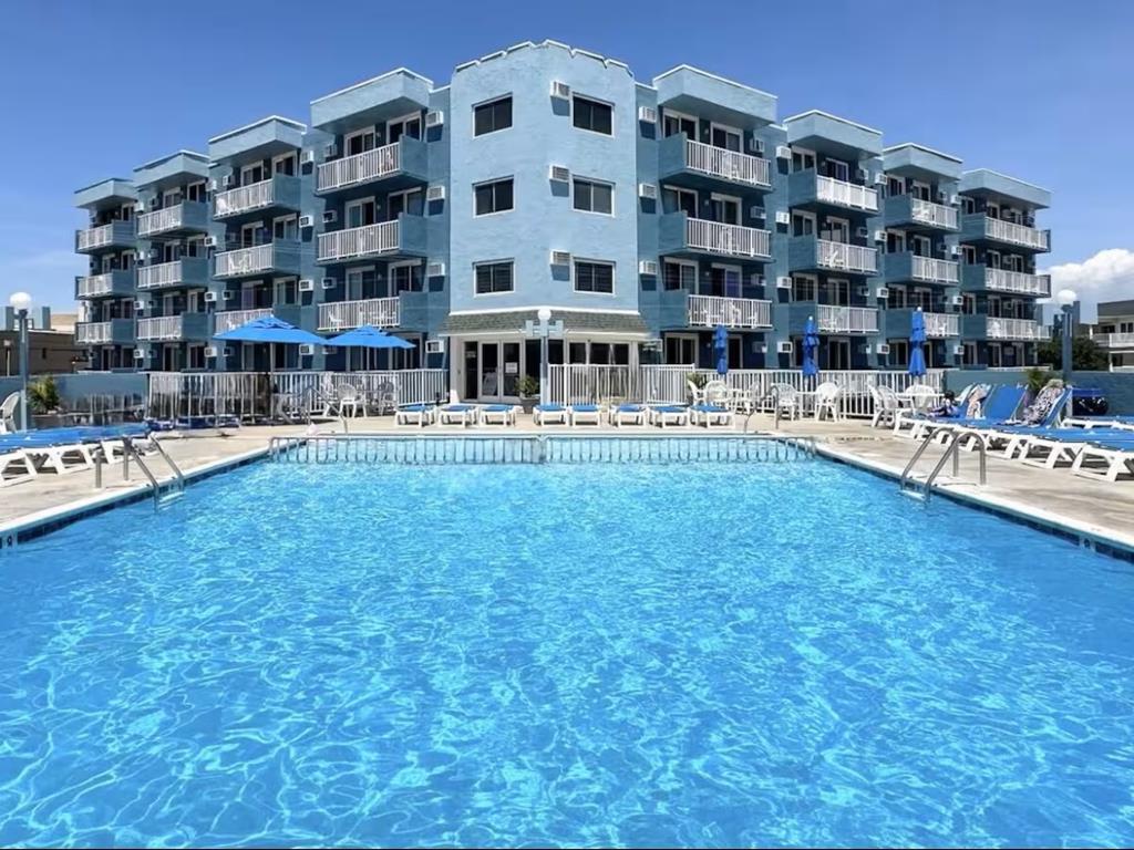 225 EAST WILDWOOD AVENUE - DIPLOMAT RESORT CONDOMINIUMS Unit 505 - WILDWOOD SUMMER VACATION RENTALS - only 2 short blocks from the world-famous Wildwood boardwalk, beach and amusements. Large pool and sundeck make this elevator building the perfect summer vacation for the whole family. 1 bedroom, 1 bath condo located at the Diplomat Condominiums in Wildwood. Unit has a kitchen with stovetop, fridge, microwave, toaster and coffeemaker. Sleeps 4; 1 King and 1 Double sleep sofa. Amenities include large pool, outside shower, one car off street parking, gas bbq, elevator, arcade and wall a/c. Wildwood Rentals, North Wildwood Rentals, Wildwood Crest Rentals and Diamond Beach Rentals in all price ranges for weekly, monthly, seasonal and weekend vacation rentals plus Wildwood real estate sales of homes, condos, vacation and investment properties in and around Wildwood New Jersey. We offer over 400 properties plus exclusive vacation homes so you can book the shore rental of your choice online and guarantee your vacation at the Shore. Rent with confidence at Island Realty Group! Visit www.wildwoodrents.com to book online or call our office at 609.522.4999. We're open 7 days a week!