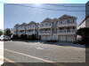 306 EAST PINE AVENUE - UNIT 200 - WILDWOOD SUMMER VACATION RENTALS with POOLS - Three bedroom, two bath vacation home w/POOL! Located 1 block to the beach and boardwalk! Brand new everything! Stainless appliances in the kitchen. Fridge, range, dishwasher, microwave, coffeemaker and toaster. Sleeps 9; 2 queen, full/twin bunk and queen sleep sofa. Amenities include central a/c, washer/dryer, outside shower, and 3 car off street parking! Great location between both amusement piers!  Wildwood Rentals, North Wildwood Rentals, Wildwood Crest Rentals and Diamond Beach Rentals in all price ranges for weekly, monthly, seasonal and weekend vacation rentals plus Wildwood real estate sales of homes, condos, vacation and investment properties in and around Wildwood New Jersey. We offer over 400 properties plus exclusive vacation homes so you can book the shore rental of your choice online and guarantee your vacation at the Shore. Rent with confidence at Island Realty Group! Visit www.wildwoodrents.com to book online or call our office at 609.522.4999. Our office at 1701 New Jersey Avenue in North Wildwood is open 7 days a week!