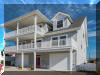 309 WEST WALNUT AVENUE - NORTH WILDWOOD BAYSIDE SUMMER VACATION RENTALS at WILDWOODRENTS.COM managed by ISLAND REALTY GROUP - 4 bedroom, 3 bath vacation home located bayside with water way views and slight ocean view! Large floor plan! Home boasts a family room on the first level with a pool table, large TV, and bar. 2nd floor offers a large fully equipped kitchen, dining, and living room. 2 bedrooms and a 1 bathroom. Third floor has two additional bedrooms and two baths. Three balconies and back yard for outdoor enjoyment! Amenities include central a/c, washer/dryer, wifi, outside shower, and 4 car off street parking. Sleeps 14: king, 3 queen, 2 full/twin bunks, and sleep sofa.  - North Wildwood Rentals, Wildwood Rentals, Wildwood Crest Rentals and Diamond Beach Rentals in all price ranges for weekly, monthly, seasonal and weekend vacation rentals plus Wildwood real estate sales of homes, condos, vacation and investment properties in and around Wildwood New Jersey. We offer over 400 properties plus exclusive vacation homes so you can book the shore rental of your choice online and guarantee your vacation at the Shore. Rent with confidence at Island Realty Group! Visit www.wildwoodrents.com to book online or call our office at 609.522.4999. Our office at 1701 New Jersey Avenue in North Wildwood is open 7 days a week!