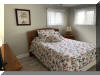 318 EAST HOLLYWOOD AVENUE  UNIT 2 - WILDWOOD CREST SUMMER VACATION RENTALS at WILDWOODRENTS.COM managed by ISLAND REALTY GROUP - Welcome to your perfect beachside getaway in Wildwood Crest! This charming property is ideal for a group of up to 6 guests, offering 2 bedrooms and 1 full bathroom for your comfort and convenience. As you step inside, you'll find a cozy and well-appointed living space with modern amenities to make your stay unforgettable. The living room features a comfortable sofa bed, perfect for relaxing after a day at the beach. Enjoy movie nights with the DVD player and streaming services on the smart TV. The kitchen is fully equipped with everything you need to whip up delicious meals, including a dishwasher, microwave, coffee maker, and toaster. The dining area is perfect for enjoying meals together with your loved ones. Both bedrooms are tastefully decorated and offer a peaceful retreat after a day of sun and sand. The first bedroom features a double bed, while the second bedroom has a twin bed with twin trundle for additional sleeping space. All beds come with mattress pads, pillows, and blankets for your comfort. Step outside to the deck and soak up the sun or enjoy a BBQ with friends and family. Take a refreshing dip in the outdoor pool or rinse off in the shared outdoor shower after a day at the beach. Additional amenities include central AC, ceiling fans, a washer and dryer, iron, ironing board, vacuum cleaner, high-speed internet, and smart TVs in each bedroom. Parking is a breeze with one designated parking space. This property is pet-friendly, so feel free to bring your furry friends along for the vacation. Please note that tenants are required to bring their own linens. Don't miss out on this fantastic opportunity to experience the best of Wildwood Crest! Book your stay today and create lasting memories in this beautiful beachside retreat. Wildwood Crest Rentals, North Wildwood Rentals, Wildwood Rentals and Diamond Beach Rentals in all price ranges for weekly, monthly, seasonal and weekend vacation rentals plus Wildwood real estate sales of homes, condos, vacation and investment properties in and around Wildwood New Jersey. We offer over 400 properties plus exclusive vacation homes so you can book the shore rental of your choice online and guarantee your vacation at the Shore. Rent with confidence at Island Realty Group! Visit www.wildwoodrents.com to book online or call our office at 609.522.4999. Our office at 1701 New Jersey Avenue in North Wildwood is open 7 days a week!