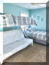 320 EAST 25TH AVENUE UNIT C  NORTH WILDWOOD SUMMER VACATION RENTALS - Three bedroom, two bath vacation home located 1.5 blocks to the beach and boardwalk in North Wildwood. Home offers a full kitchen with range, fridge, icemaker, dishwasher, microwave, disposal, blender, toaster, coffee maker. Amenities include central a/c, washer/dryer, 2 car off street parking with 1 in the driveway and 1 garage spot, balcony and wifi. Sleeping includes; 2 queen, full/twin bunk bed and twin, queen sleep sofa.***Living room TV only cable ready, bunk room and master bedroom Roku TV. North Wildwood Rentals, Wildwood Rentals, Wildwood Crest Rentals and Diamond Beach Rentals in all price ranges for weekly, monthly, seasonal and weekend vacation rentals plus Wildwood real estate sales of homes, condos, vacation and investment properties in and around Wildwood New Jersey. We offer over 400 properties plus exclusive vacation homes so you can book the shore rental of your choice online and guarantee your vacation at the Shore. Rent with confidence at Island Realty Group!