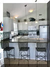 320 EAST 25TH AVENUE UNIT C  NORTH WILDWOOD SUMMER VACATION RENTALS - Three bedroom, two bath vacation home located 1.5 blocks to the beach and boardwalk in North Wildwood. Home offers a full kitchen with range, fridge, icemaker, dishwasher, microwave, disposal, blender, toaster, coffee maker. Amenities include central a/c, washer/dryer, 2 car off street parking with 1 in the driveway and 1 garage spot, balcony and wifi. Sleeping includes; 2 queen, full/twin bunk bed and twin, queen sleep sofa.***Living room TV only cable ready, bunk room and master bedroom Roku TV. North Wildwood Rentals, Wildwood Rentals, Wildwood Crest Rentals and Diamond Beach Rentals in all price ranges for weekly, monthly, seasonal and weekend vacation rentals plus Wildwood real estate sales of homes, condos, vacation and investment properties in and around Wildwood New Jersey. We offer over 400 properties plus exclusive vacation homes so you can book the shore rental of your choice online and guarantee your vacation at the Shore. Rent with confidence at Island Realty Group!