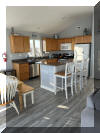 308 WEST GARFIELD AVENUE  UNIT B - WILDWOOD SUMMER VACATION RENTALS at WILDWOODRENTS.COM managed by ISLAND REALTY GROUP - 4 bedroom, 2 bath vacation home location bayside in Wildwood. Home offers a full kitchen with range, fridge, dishwasher, microwave, toaster, Keurig, disposal, and blender. Sleeps 11; 3 queen, (2) twin/twin bunks, one twin trundle. Amenities include central a/c, washer/dryer, wifi, 1 car garage, 1 car driveway parking, storage area, and outside shower. Wildwood Rentals, North Wildwood Rentals, Wildwood Crest Rentals and Diamond Beach Rentals in all price ranges for weekly, monthly, seasonal and weekend vacation rentals plus Wildwood real estate sales of homes, condos, vacation and investment properties in and around Wildwood New Jersey. We offer over 400 properties plus exclusive vacation homes so you can book the shore rental of your choice online and guarantee your vacation at the Shore. Rent with confidence at Island Realty Group! Visit www.wildwoodrents.com to book online or call our office at 609.522.4999. Our office at 1701 New Jersey Avenue in North Wildwood is open 7 days a week!