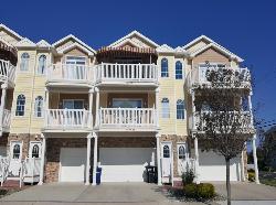 333 EAST 11TH AVENUE #200 - NORTH WILDWOOD SUMMER VACATION RENTALS - Three bedroom, two bath vacation home located 1.5 blocks from the beach. Home offers a full kitchen with range, fridge, icemaker, dishwasher, disposal, coffeemaker, microwave, blender, toaster. Amenities include central a/c, washer/dryer, balcony, outside shower, and two car off street parking. Sleeping; queen, 3 full, 5 twin. Max occupancy 10 including children. North Wildwood Rentals, Wildwood Rentals, Wildwood Crest Rentals and Diamond Beach Rentals in all price ranges for weekly, monthly, seasonal and weekend vacation rentals plus Wildwood real estate sales of homes, condos, vacation and investment properties in and around Wildwood New Jersey. We offer over 400 properties plus exclusive vacation homes so you can book the shore rental of your choice online and guarantee your vacation at the Shore. Rent with confidence at Island Realty Group!