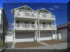 351 EAST WILDWOOD AVENUE #102 - WILDWOOD RENTALS IN WILDWOOD NEW JERSEY - Three bedroom, two bath vacation home located 100 ft to the beach and boardwalk in the heart of the island. Home offers a newly renovated kitchen with range, fridge, dishwasher, ice maker, microwave, coffeemaker and toaster. Amenities include central a/c, washer/dryer, outside shower, 3 car off street parking. Balcony offers a fantastic view of the Ferris-wheel and Friday night fireworks. Bedding includes 2 standard double beds and 2 full/twin pyramid bunks. Wildwood Rentals, North Wildwood Rentals, Wildwood Crest Rentals and Diamond Beach Rentals in all price ranges for weekly, monthly, seasonal and weekend vacation rentals plus Wildwood real estate sales of homes, condos, vacation and investment properties in and around Wildwood New Jersey. We offer over 400 properties plus exclusive vacation homes so you can book the shore rental of your choice online and guarantee your vacation at the Shore. Rent with confidence at Island Realty Group!