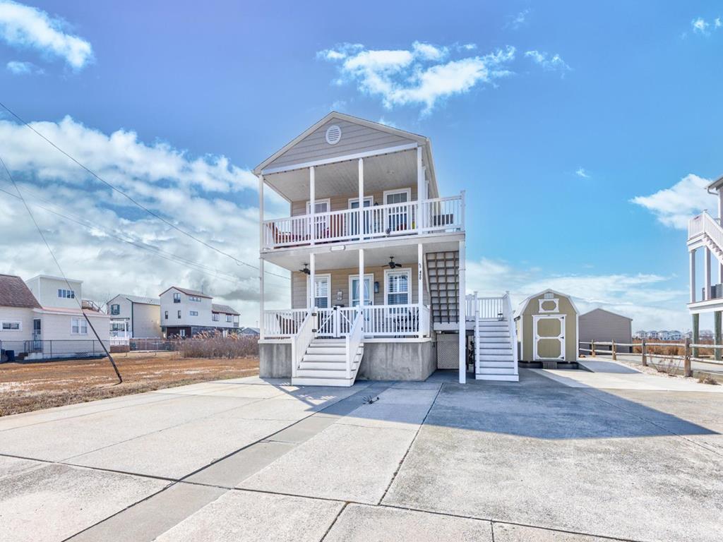 400 WEST 19TH AVENUE - NORTH WILDWOOD SUMMER VACATION RENTALS at WILDWOODRENTS.COM managed by ISLAND REALTY GROUP - Intracoastal Water Views! 3 bedroom 2 bath vacation home located on the bayside with amazing views. Full kitchen with range, fridge, dishwasher, microwave, Keurig, convection oven and blender. Sleeps 6, king, 2 queen, and queen sleep sofa. Amenities include central a/c, wifi, 2 car off street parking, outside shower. North Wildwood Rentals, Wildwood Rentals, Wildwood Crest Rentals and Diamond Beach Rentals in all price ranges for weekly, monthly, seasonal and weekend vacation rentals plus Wildwood real estate sales of homes, condos, vacation and investment properties in and around Wildwood New Jersey. We offer over 400 properties plus exclusive vacation homes so you can book the shore rental of your choice online and guarantee your vacation at the Shore. Rent with confidence at Island Realty Group! Visit www.wildwoodrents.com to book online or call our office at 609.522.4999. Our office at 1701 New Jersey Avenue in North Wildwood is open 7 days a week!