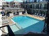405 OCEAN AVENUE  MEDITERRANEAN #212 - NORTH WILDWOOD BEACHBLOCK SUMMER VACATION RENTALS with POOLS at WILDWOODRENTS.COM - Swim in the pool, walk down the block to the beach, or to the boardwalk for rides and games. Wildwood offers the only free beach at the Jersey shore, and this newly refurbished, two-bedroom condo in quiet North Wildwood is right at the end of the beach block. Its also within walking distance of the boardwalk, about ten blocks away. On the boardwalk, there are three Morey s Piers, each with its own array of carnival rides and games. There s always something for the kids to do. This second floor condo has two double-beds in one bedroom, one in the other, and a pull-out couch, so it can sleep up to 8 people. There are two bathrooms, a living room and a kitchenette. Also a patio to sit and watch the kids frolic in the pool plus a gas BBQ grill. Everything you need for a great summer vacation is right here! North Wildwood Rentals, Wildwood Rentals, Wildwood Crest Rentals and Diamond Beach Rentals in all price ranges for weekly, monthly, seasonal and weekend vacation rentals plus Wildwood real estate sales of homes, condos, vacation and investment properties in and around Wildwood New Jersey. We offer over 400 properties plus exclusive vacation homes so you can book the shore rental of your choice online and guarantee your vacation at the Shore. Rent with confidence at Island Realty Group! Visit www.wildwoodrents.com to book online or call our office at 609.522.4999. Our office at 1701 New Jersey Avenue in North Wildwood is open 7 days a week!