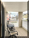 411 EAST 10TH AVENUE  #101 - NORTH WILDWOOD SUMMER VACATION RENTALS at WILDWOODRENTS.COM managed by ISLAND REALTY GROUP - Welcome to your perfect beachside getaway located only 1 block to the Beach in North Wildwood! This charming property is ideal for a family of 4, offering 2 bedrooms and 2 full bathrooms for your comfort and convenience. As you step inside, you'll find a cozy living space with modern amenities to make your stay enjoyable. The fully equipped kitchen features a dishwasher, microwave, disposal, toaster, stove, full-size refrigerator, oven, and all the cooking essentials you need. Whether you're preparing a quick snack or a gourmet meal, this kitchen has you covered. After a day at the beach, unwind in the comfortable bedrooms, including 1 queen bed and 2 single beds. With central AC, ceiling fans, and a smoke-free environment, you'll stay cool and refreshed throughout your stay. The property also includes a washer, dryer, vacuum cleaner, and cleaning services included in the rate for added convenience. Relax on the balcony with a cup of coffee from the Keurig machine, or catch up on your favorite shows on the television with cable TV and high-speed internet. Parking is a breeze with 1 parking space available for your use. Please note that this property does not allow pets and tenants are required to bring their own linens. The property comes fully furnished with blankets, pillows, pots, pans, silverware, dinnerware, and cooking utensils for your comfort. Don't miss out on this fantastic opportunity to enjoy a beachside retreat in North Wildwood. Book your stay today and create unforgettable memories in this beautiful vacation rental! North Wildwood Rentals, Wildwood Rentals, Wildwood Crest Rentals and Diamond Beach Rentals in all price ranges for weekly, monthly, seasonal and weekend vacation rentals plus Wildwood real estate sales of homes, condos, vacation and investment properties in and around Wildwood New Jersey. We offer over 400 properties plus exclusive vacation homes so you can book the shore rental of your choice online and guarantee your vacation at the Shore. Rent with confidence at Island Realty Group! Visit www.wildwoodrents.com to book online or call our office at 609.522.4999. Our office at 1701 New Jersey Avenue in North Wildwood is open 7 days a week!