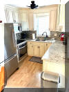 411 EAST 10TH AVENUE  #101 - NORTH WILDWOOD SUMMER VACATION RENTALS at WILDWOODRENTS.COM managed by ISLAND REALTY GROUP - Welcome to your perfect beachside getaway located only 1 block to the Beach in North Wildwood! This charming property is ideal for a family of 4, offering 2 bedrooms and 2 full bathrooms for your comfort and convenience. As you step inside, you'll find a cozy living space with modern amenities to make your stay enjoyable. The fully equipped kitchen features a dishwasher, microwave, disposal, toaster, stove, full-size refrigerator, oven, and all the cooking essentials you need. Whether you're preparing a quick snack or a gourmet meal, this kitchen has you covered. After a day at the beach, unwind in the comfortable bedrooms, including 1 queen bed and 2 single beds. With central AC, ceiling fans, and a smoke-free environment, you'll stay cool and refreshed throughout your stay. The property also includes a washer, dryer, vacuum cleaner, and cleaning services included in the rate for added convenience. Relax on the balcony with a cup of coffee from the Keurig machine, or catch up on your favorite shows on the television with cable TV and high-speed internet. Parking is a breeze with 1 parking space available for your use. Please note that this property does not allow pets and tenants are required to bring their own linens. The property comes fully furnished with blankets, pillows, pots, pans, silverware, dinnerware, and cooking utensils for your comfort. Don't miss out on this fantastic opportunity to enjoy a beachside retreat in North Wildwood. Book your stay today and create unforgettable memories in this beautiful vacation rental! North Wildwood Rentals, Wildwood Rentals, Wildwood Crest Rentals and Diamond Beach Rentals in all price ranges for weekly, monthly, seasonal and weekend vacation rentals plus Wildwood real estate sales of homes, condos, vacation and investment properties in and around Wildwood New Jersey. We offer over 400 properties plus exclusive vacation homes so you can book the shore rental of your choice online and guarantee your vacation at the Shore. Rent with confidence at Island Realty Group! Visit www.wildwoodrents.com to book online or call our office at 609.522.4999. Our office at 1701 New Jersey Avenue in North Wildwood is open 7 days a week!