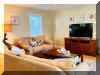 414 EAST 17TH AVENUE  UNIT 1 - NORTH WILDWOOD SUMMER VACATION RENTALS at WILDWOODRENTS.COM managed by ISLAND REALTY GROUP - Welcome to your perfect beachside getaway in North Wildwood! This charming property is ideal for a family of up to 7 guests, offering 2 bedrooms and 2 full bathrooms for your comfort and convenience. As you step inside, you'll find a cozy and well-appointed space featuring a variety of sleeping arrangements including a Queen bed, full/twin bunk, and double Sofa bed,. The property is fully furnished and equipped with modern amenities to ensure a relaxing stay. The kitchen is a chef's dream with a dishwasher, microwave, disposal, toaster, blender, stove, full-size refrigerator, oven, Keurig coffee maker, and all the necessary cookware and dinnerware. Whether you're preparing a quick snack or a gourmet meal, you'll find everything you need right at your fingertips. Stay cool and comfortable with central AC and ceiling fans throughout the property. Entertainment options abound with cable TV, high-speed internet, and 2 Smart TVs with streaming services for your viewing pleasure. After a fun day at the beach, rinse off in the convenient outdoor shower and relax on the deck with deck furniture, enjoying the fresh sea breeze. Beach equipment including 4 beach chairs is provided for your enjoyment. Parking is a breeze with 2 designated parking spaces available. This property is smoke-free and does not allow pets. Tenants bring their own linens. A washer/dryer is available for your convenience. Experience the best of North Wildwood from this fantastic beachside retreat. Book your stay today and create unforgettable memories with your loved ones in this beautiful coastal paradise! - North Wildwood Rentals, Wildwood Rentals, Wildwood Crest Rentals and Diamond Beach Rentals in all price ranges for weekly, monthly, seasonal and weekend vacation rentals plus Wildwood real estate sales of homes, condos, vacation and investment properties in and around Wildwood New Jersey. We offer over 400 properties plus exclusive vacation homes so you can book the shore rental of your choice online and guarantee your vacation at the Shore. Rent with confidence at Island Realty Group! Visit www.wildwoodrents.com to book online or call our office at 609.522.4999. Our office at 1701 New Jersey Avenue in North Wildwood is open 7 days a week!