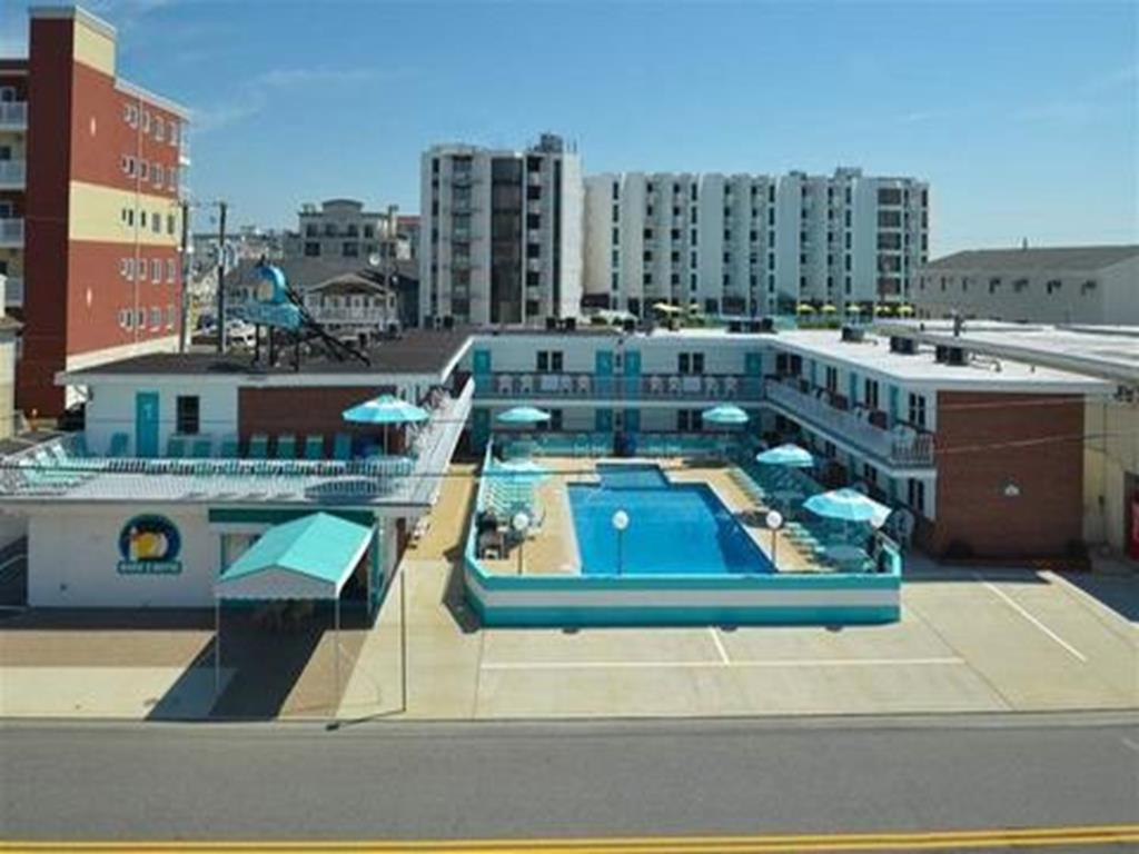 415 EAST ATLANTA AVENUE – OCEANS 7 MARK 1 CONDOS #204 - WILDWOOD CREST BEACHBLOCK SUMMER VACATION RENTALS with POOLS at WILDWOODRENTS.COM - One bedroom, one bath condo located beach block in Wildwood Crest. Home offers a full kitchen with range, fridge, microwave, toaster and coffee maker. Sleeps 6, full in bedroom, full and full sleep sofa in living area. Amenities include pool, gas grill, balcony, coin-op washer/dryer, and one car off street parking. There are 2 smart televisions that can be utilized for free streaming apps or any apps that you can access via your account information. Cable service is not provided. Wildwood Crest Rentals, North Wildwood Rentals, Wildwood Rentals and Diamond Beach Rentals in all price ranges for weekly, monthly, seasonal and weekend vacation rentals plus Wildwood real estate sales of homes, condos, vacation and investment properties in and around Wildwood New Jersey. We offer over 400 properties plus exclusive vacation homes so you can book the shore rental of your choice online and guarantee your vacation at the Shore. Rent with confidence at Island Realty Group! Visit www.wildwoodrents.com to book online or call our office at 609.522.4999. Our office at 1701 New Jersey Avenue in North Wildwood is open 7 days a week!