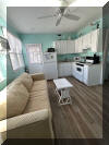 417 EAST 20TH AVENUE - OCEAN WALK #6 - NORTH WILDWOOD BEACHBLOCK SUMMER VACTION RENTALS - Two bedroom, one bath condo located at Ocean Walk Condominiums,  beach/boardwalk block. Home has a full kitchen with range, fridge, microwave, toaster and coffeemaker. Sleeps 6; queen bed, 2 twin beds, and queen sleep sofa. Amenities include wall a/c, common shared washer/dryer, deck. North Wildwood Rentals, Wildwood Rentals, Wildwood Crest Rentals and Diamond Beach Rentals in all price ranges for weekly, monthly, seasonal and weekend vacation rentals plus Wildwood real estate sales of homes, condos, vacation and investment properties in and around Wildwood New Jersey. We offer over 400 properties plus exclusive vacation homes so you can book the shore rental of your choice online and guarantee your vacation at the Shore. Rent with confidence at Island Realty Group! Visit www.wildwoodrents.com to book online or call our office at 609.522.4999. Our office at 1701 New Jersey Avenue in North Wildwood is open 7 days a week!