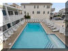 442 EAST 21ST AVENUE � LAMPOST #213 - NORTH WILDWOOD SUMMER VACATION RENTALS with POOLS at WILDWOODRENTS.COM managed by ISLAND REALTY GROUP, NORTH WILDWOOD REALTORS AND VACATION RENTAL MANAGEMENT - Welcome to your cozy beachside retreat in North Wildwood! This charming property is perfect for a family of 4 looking to enjoy a relaxing getaway by the shore. This Studio unit features 1 full bathroom and can comfortably sleep 4 guests. The sleeping arrangements include 1 double bed, 2 single beds(trundle bed), ensuring a restful night's sleep for everyone. Inside, you'll find all the comforts of home, including a well-equipped kitchen with a microwave, coffee maker, toaster oven, stove, and full-size refrigerator. The living area is furnished with a smart TV for entertainment, and high-speed internet is included for your convenience. Step outside onto the deck to soak up the sun or enjoy al fresco dining with deck furniture and a natural gas BBQ grill. The property also offers access to a heated outdoor pool, perfect for a refreshing swim on warm days. Additional amenities include ceiling fans, a washer and dryer (coin-operated), wall AC, parking for 1 vehicle, and an outdoor shower for rinsing off after a day at the beach. The property is smoke-free and does not allow pets. North Wildwood Rentals, Wildwood Rentals, Wildwood Crest Rentals and Diamond Beach Rentals in all price ranges for weekly, monthly, seasonal and weekend vacation rentals plus Wildwood real estate sales of homes, condos, vacation and investment properties in and around Wildwood New Jersey. We offer over 400 properties plus exclusive vacation homes so you can book the shore rental of your choice online and guarantee your vacation at the Shore. Rent with confidence at Island Realty Group! Visit www.wildwoodrents.com to book online or call our office at 609.522.4999. Our office at 1701 New Jersey Avenue in North Wildwood is open 7 days a week!